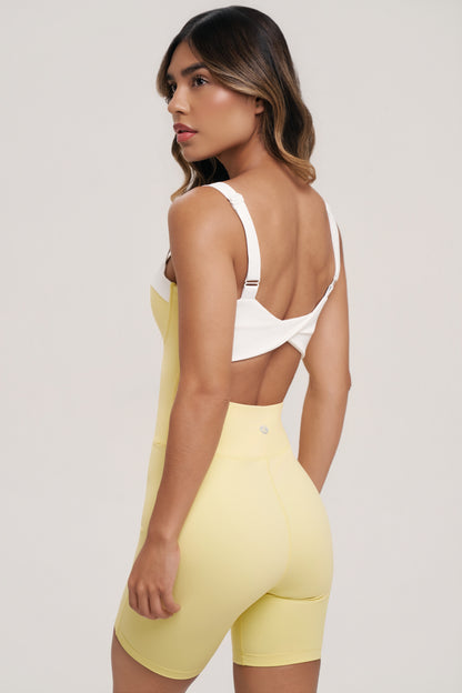 Gaia Romper | Women’s Black and White Workout Romper – Underwire Pilates Romper with Twist Back