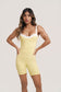 Gaia Romper | Women’s Black and White Workout Romper – Underwire Pilates Romper with Twist Back