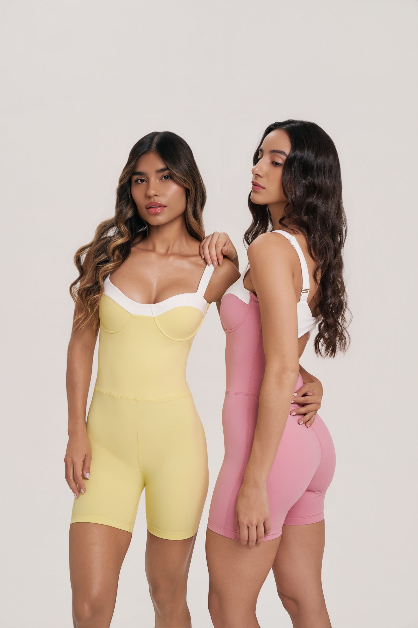 Gaia Romper | Women’s Black and White Workout Romper – Underwire Pilates Romper with Twist Back