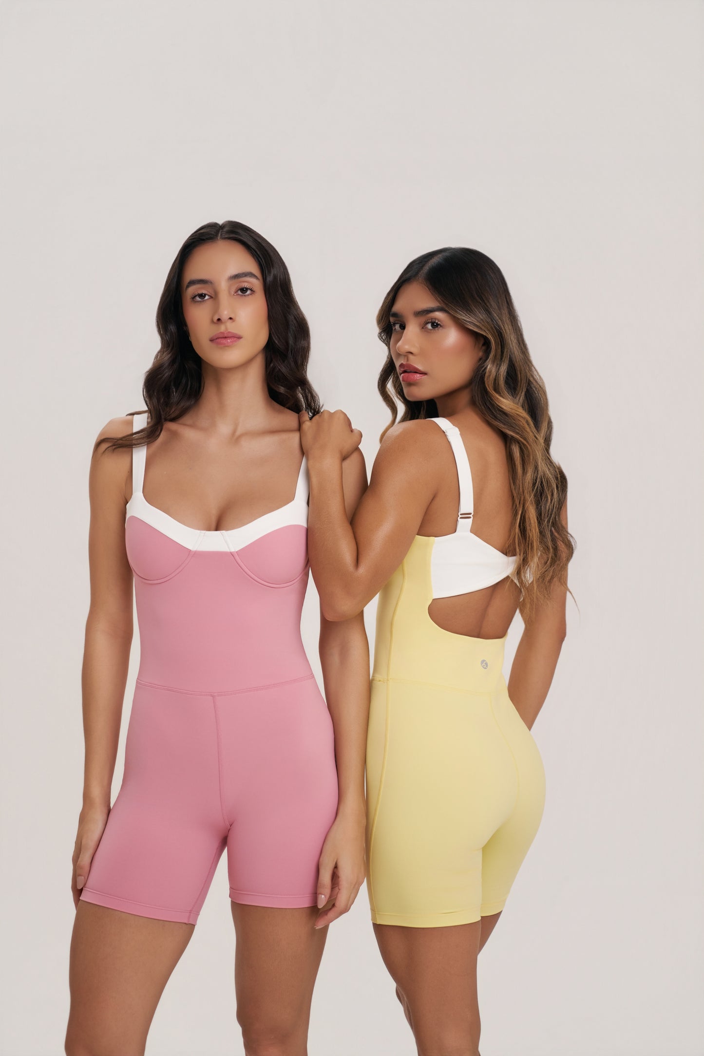Gaia Romper | Women’s Black and White Workout Romper – Underwire Pilates Romper with Twist Back