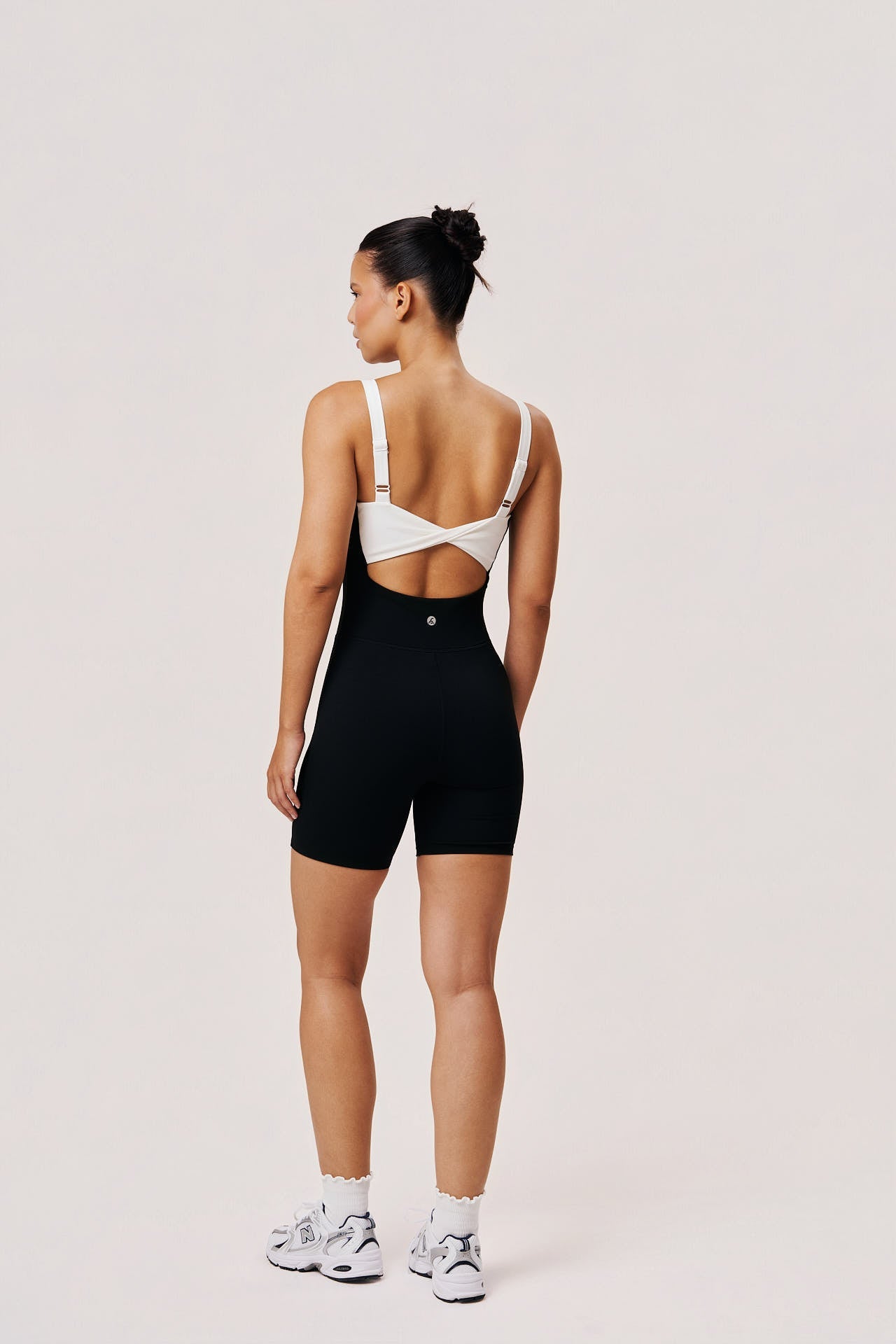 Women’s Black and White Workout Romper – Underwire Bustier Pilates Romper with Twist Back | Sabel Gaia Romper - SABEL
