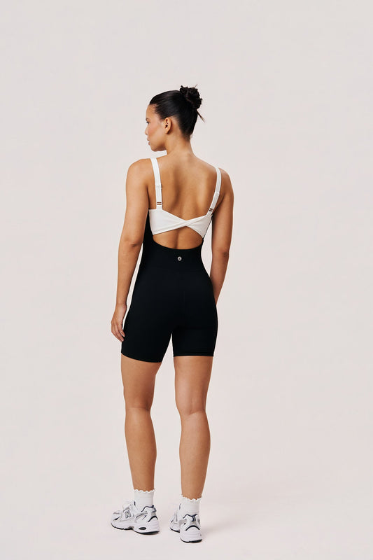 Women’s Black and White Workout Romper – Underwire Bustier Pilates Romper with Twist Back | Sabel Gaia Romper - SABEL