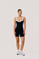 Women’s Black and White Workout Romper – Underwire Bustier Pilates Romper with Twist Back | Sabel Gaia Romper - SABEL